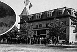 Group of men gathered outside hotel in Kennewick, September 1908 (WASTATE 1470)